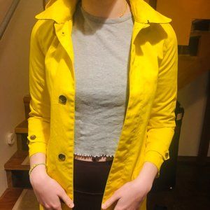 Bright yellow trench coat